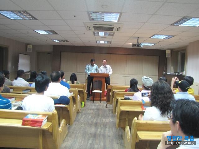 Guest speaker during tracts distribution.JPG